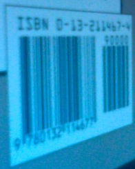 Barcode image distorted by perspective, due to photo being taken from an angle.